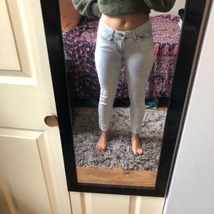 Mid rise cutoff acid wash jeans